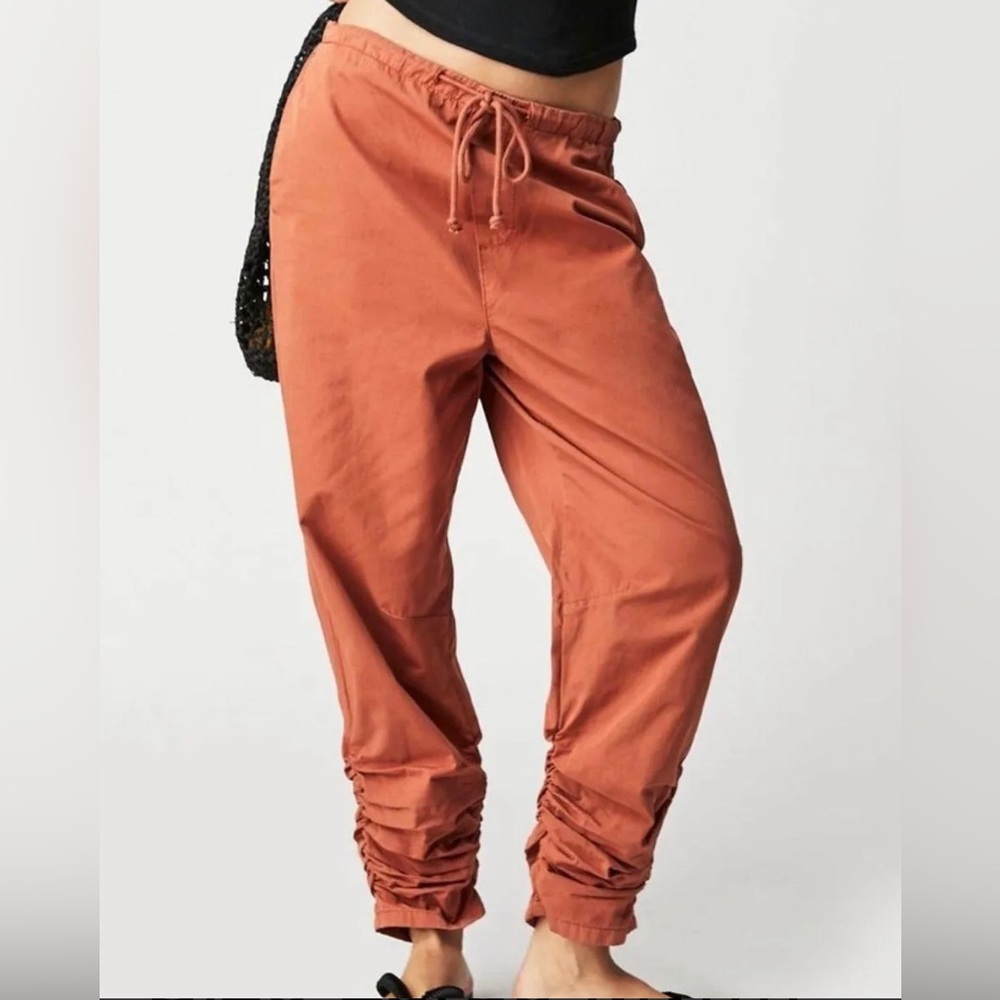 Free People low rise drop crotch drawstring waist pants cinched hem. Size M
